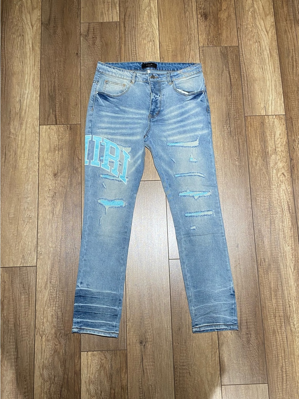 Amiri Mens Blue Ripped Slim Fit Jeans with Blue Logo Waist Size 32